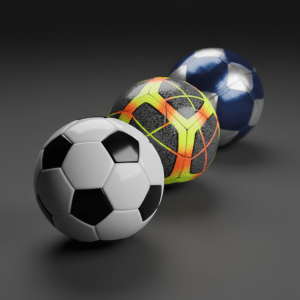 A close-up of three distinct professional-grade soccer balls arranged in a neat diagonal line on a smooth, dark matte studio surface. One ball features classic black-and-white panels, another has bold neon accents on textured micro-patterned panels, and the third showcases a modern geometric design in deep blue and silver. Soft, controlled studio lighting from above and slightly to the side creates refined reflections on the glossy surfaces and subtle gradients on the textures. The background fades into a clean, charcoal gray with a gentle vignette, emphasizing the products. Captured from a slightly elevated angle with shallow depth of field, the front ball in razor-sharp focus and the others softly receding, the mood is polished, minimal, and decisively professional.